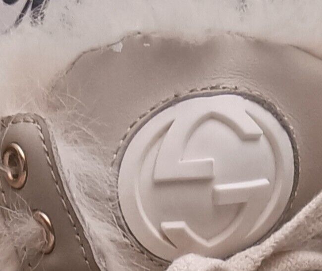 Gucci – Sneakers "Coda" Alte Pelle Guccissima Bordi in Pelliccia