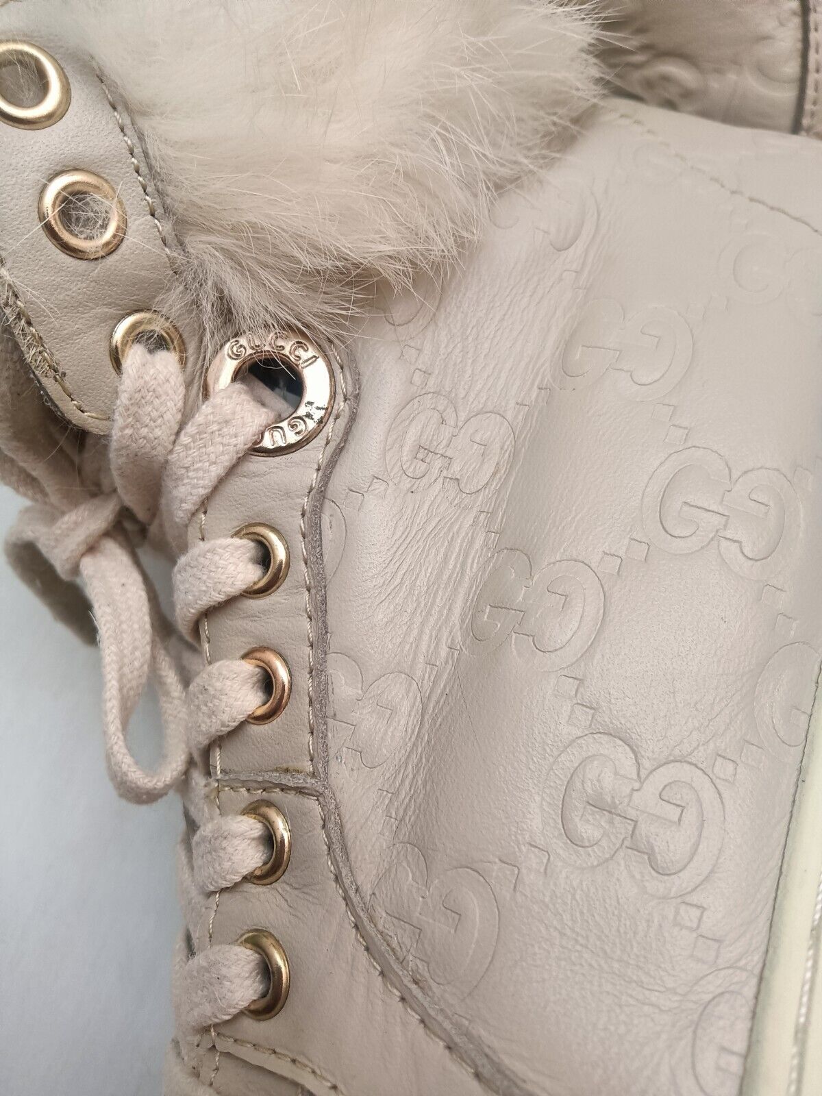 Gucci – Sneakers "Coda" Alte Pelle Guccissima Bordi in Pelliccia