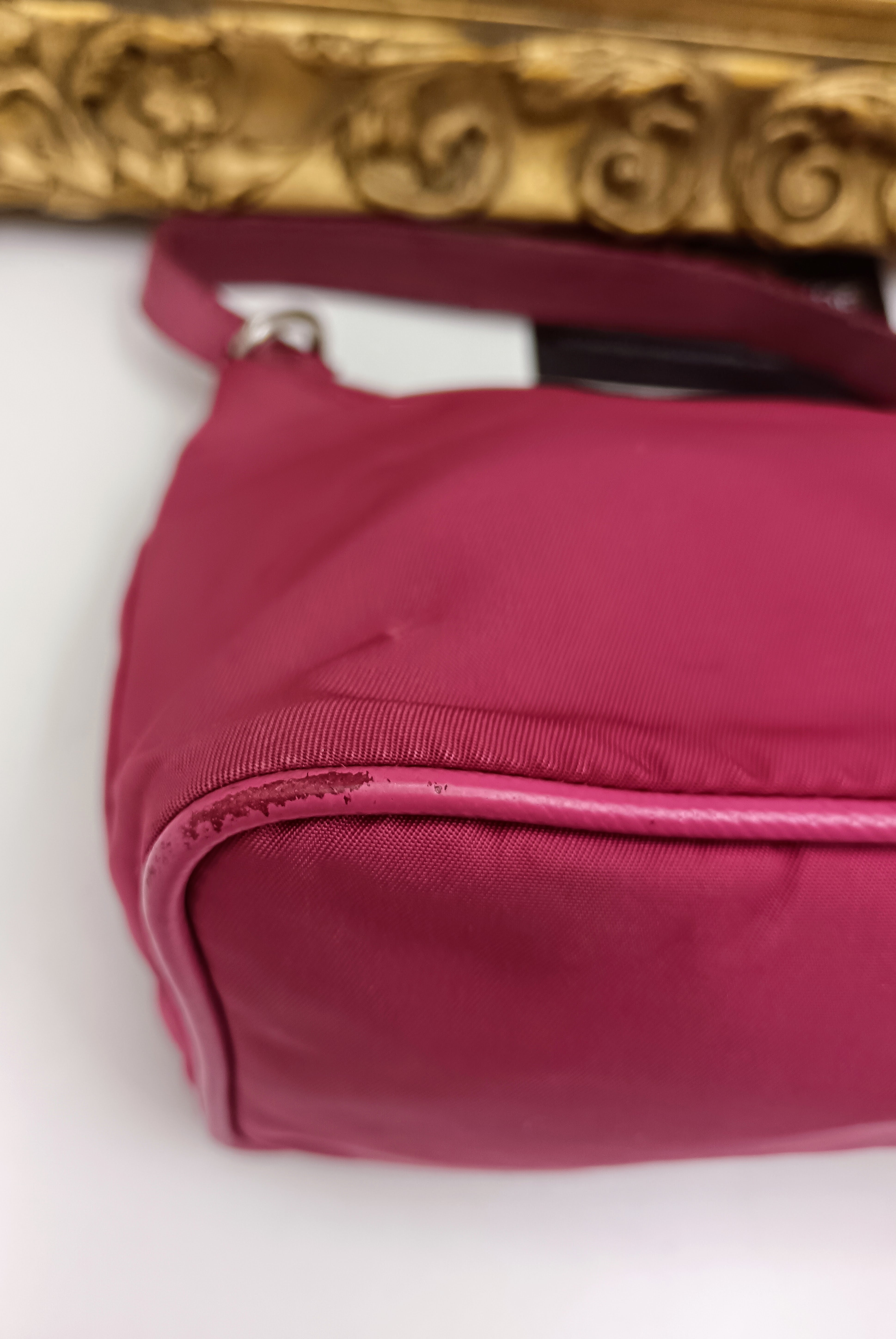 Prada – Mini Bag Pochette Re-Nylon e Pelle Saffiano