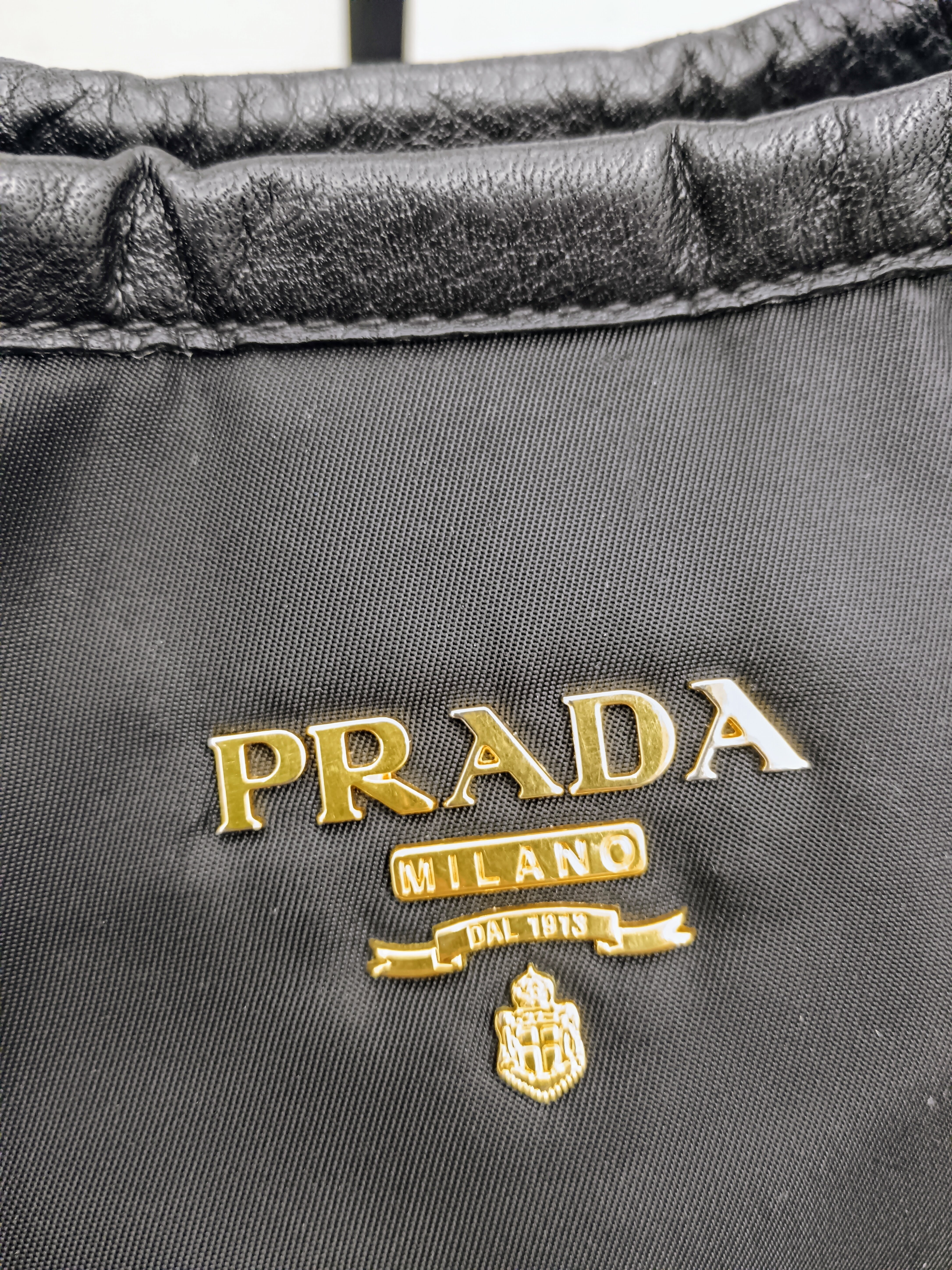 Prada - Shopper Re-Nylon e Pelle Nera Tracolla e fasce in pelle