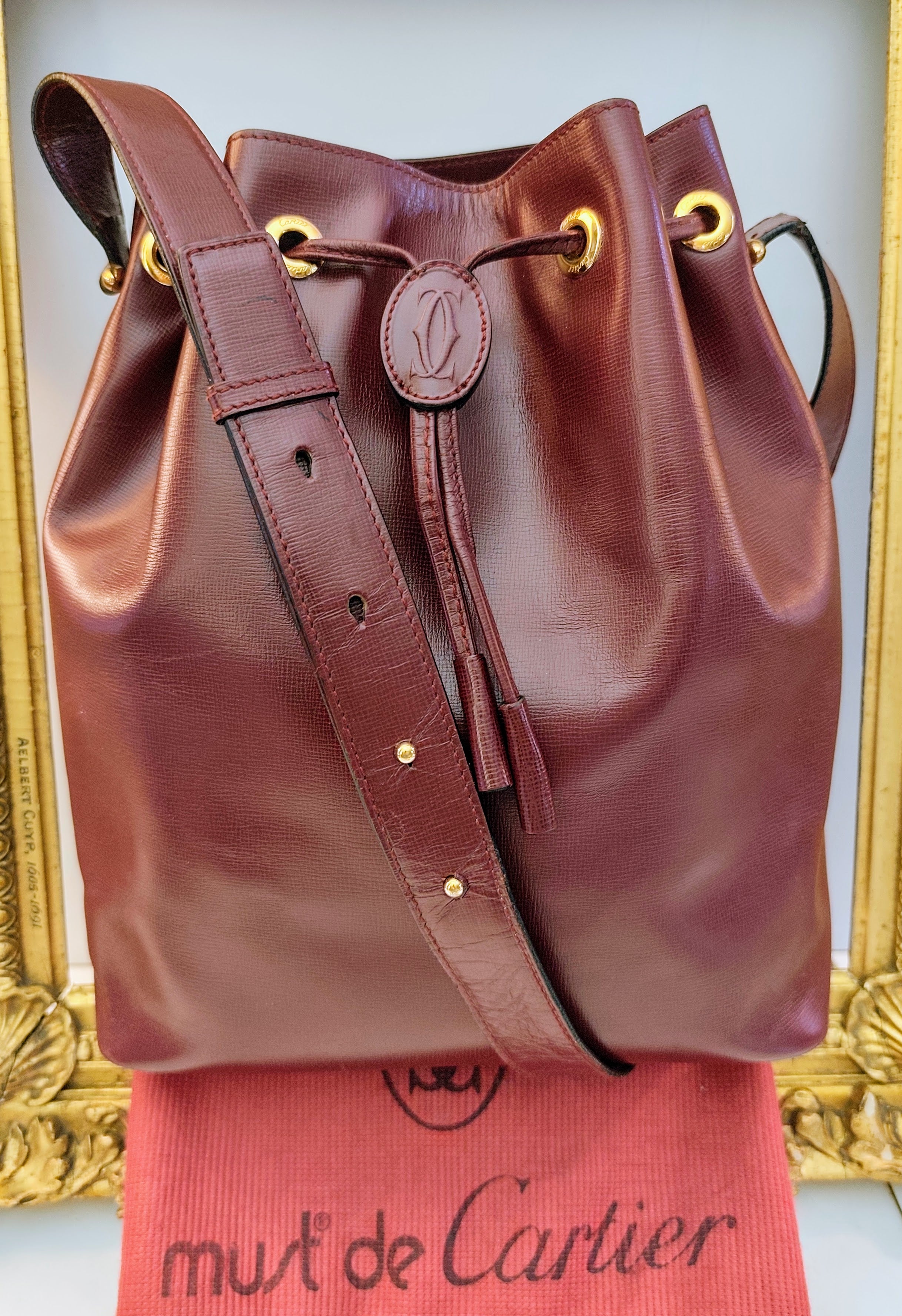 Cartier – Borsa Secchiello in Pelle Bordeaux