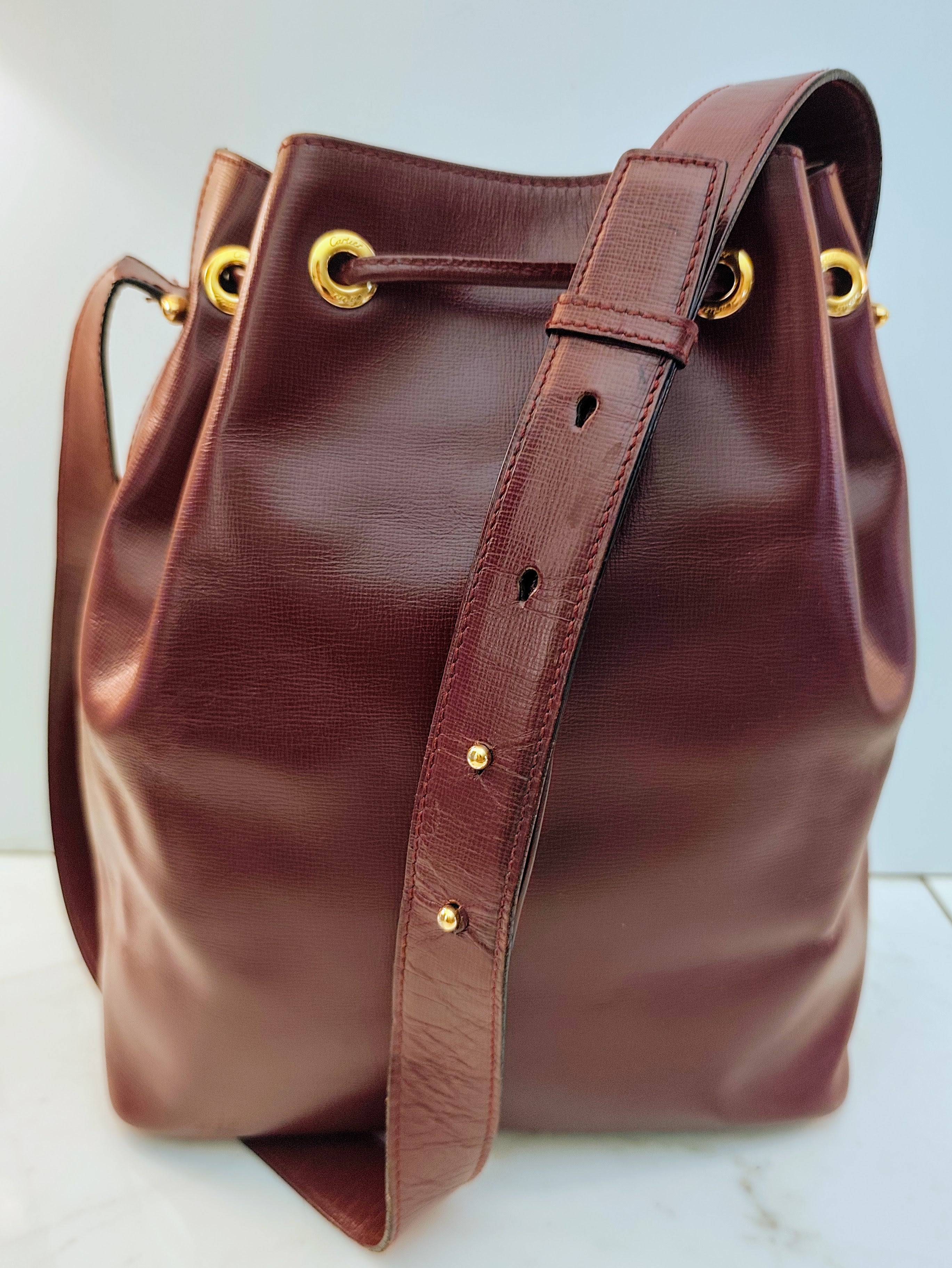 Cartier – Borsa Secchiello in Pelle Bordeaux