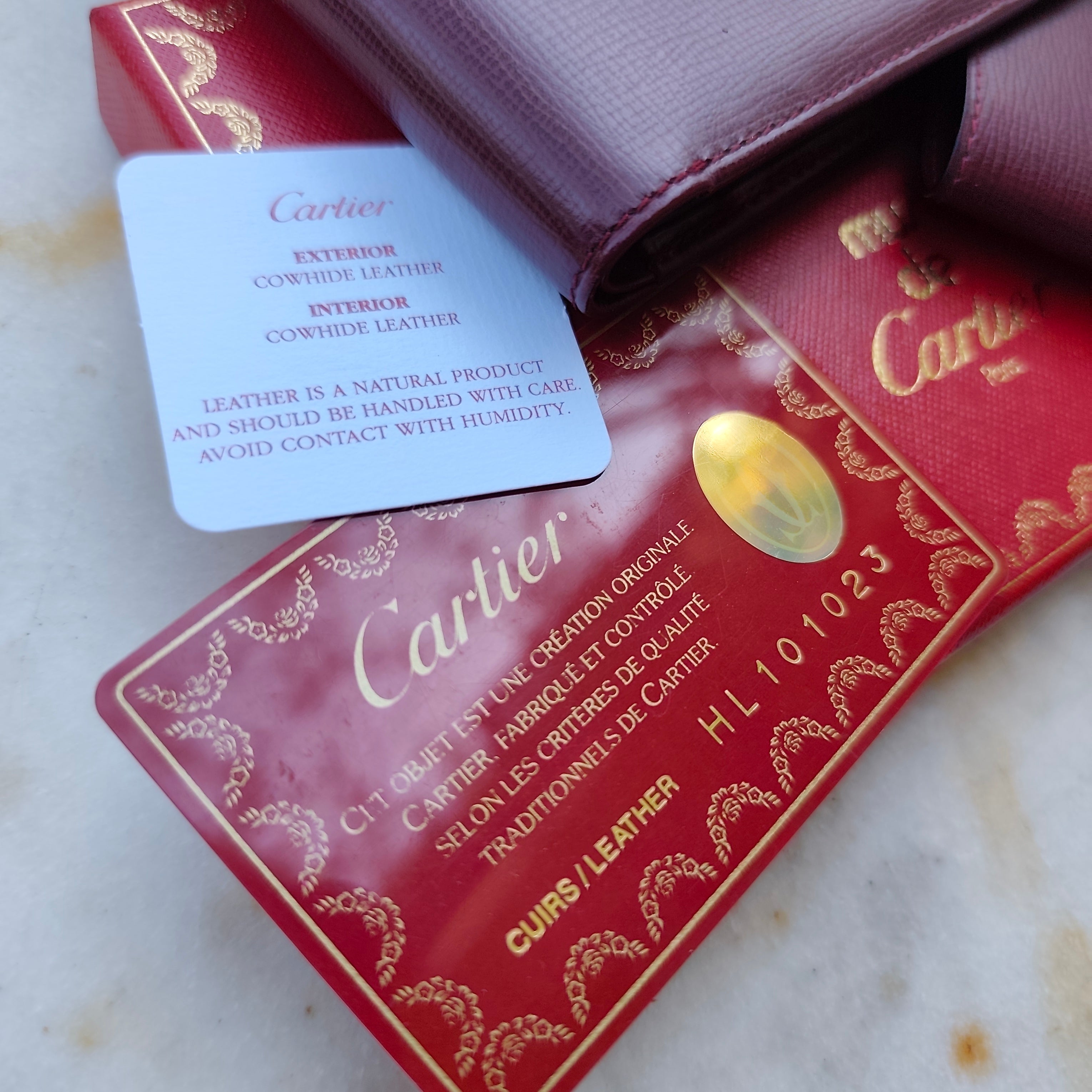 Cartier – Portafoglio con Porta Assegni Staccabile in Pelle Bordeaux