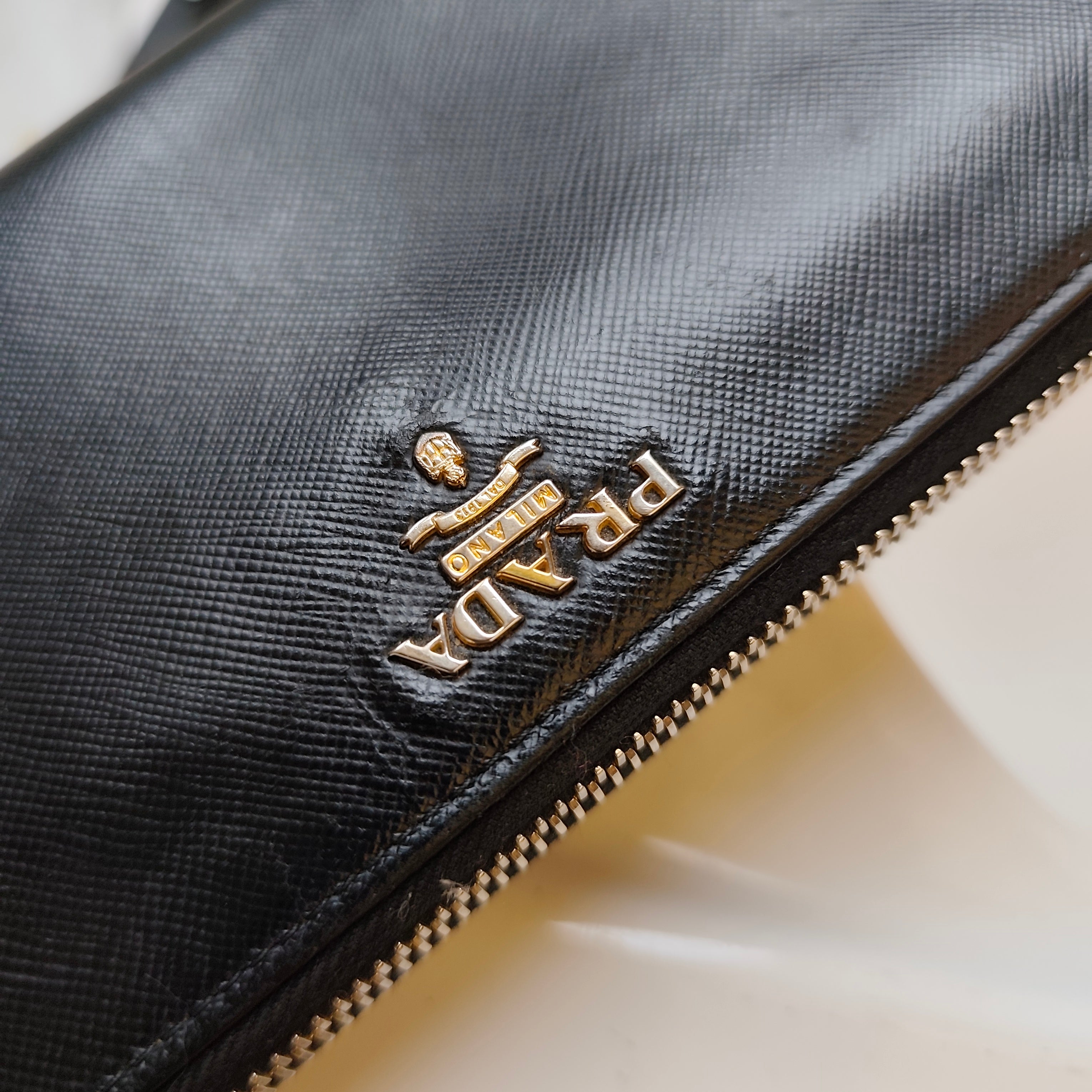 Prada - Portafoglio Continental Zip All-round in Pelle Saffiano Nero