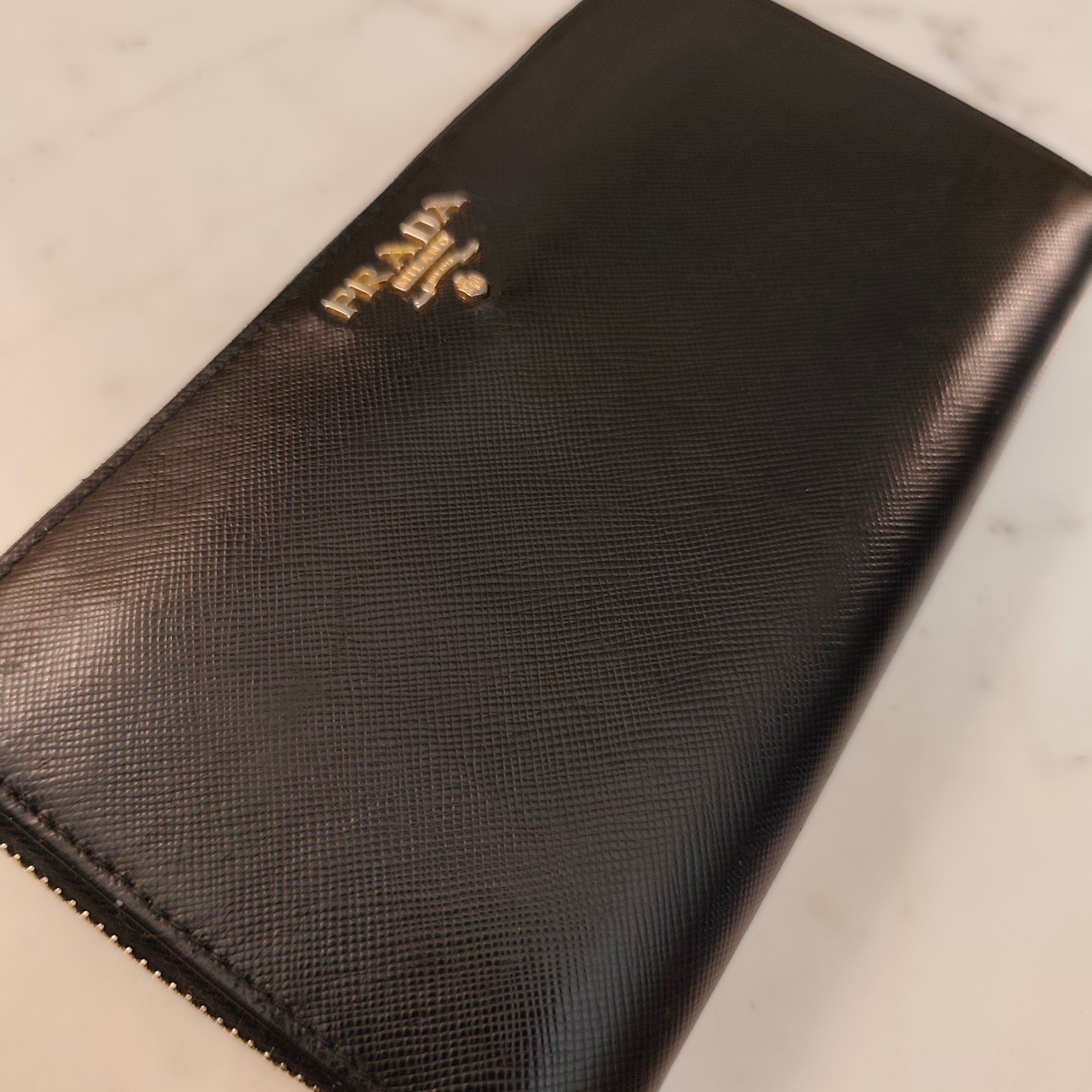 Prada - Portafoglio Continental Zip All-round in Pelle Saffiano Nero