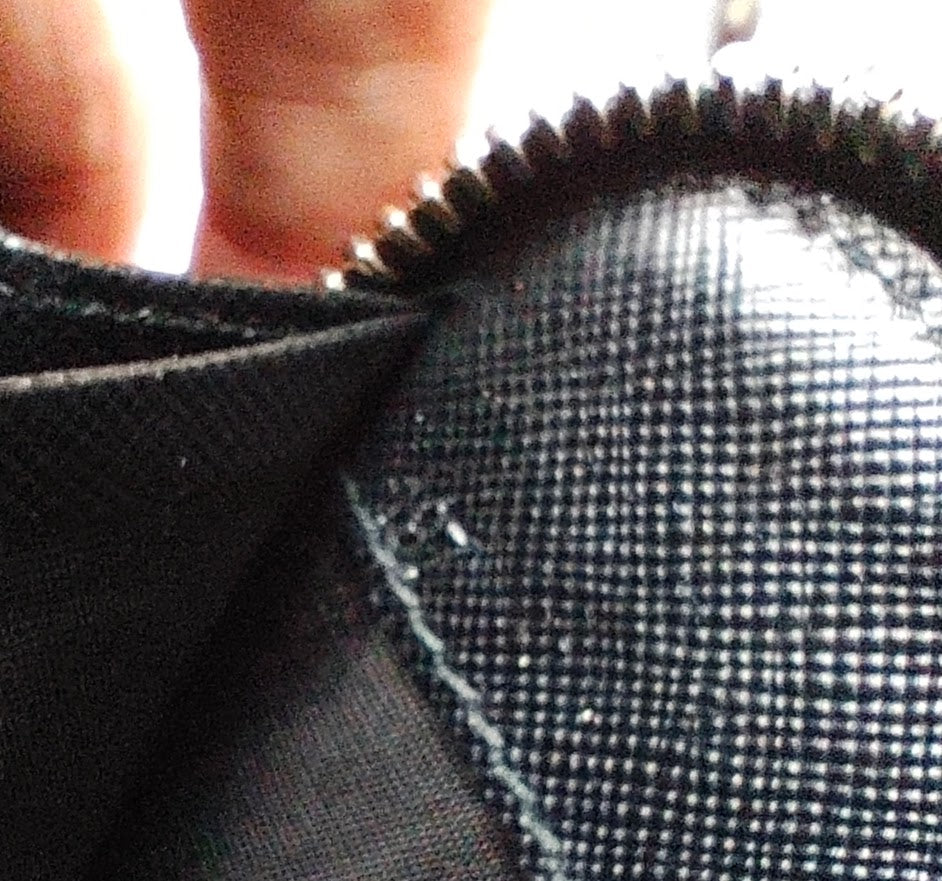 Prada - Portafoglio Continental Zip All-round in Pelle Saffiano Nero