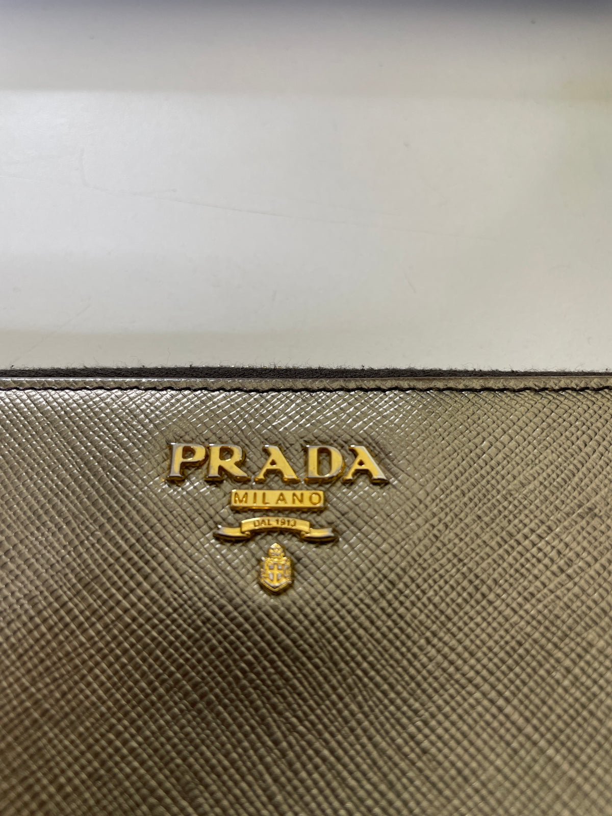 Prada Portafoglio Zip Continental Saffiano Bronzo