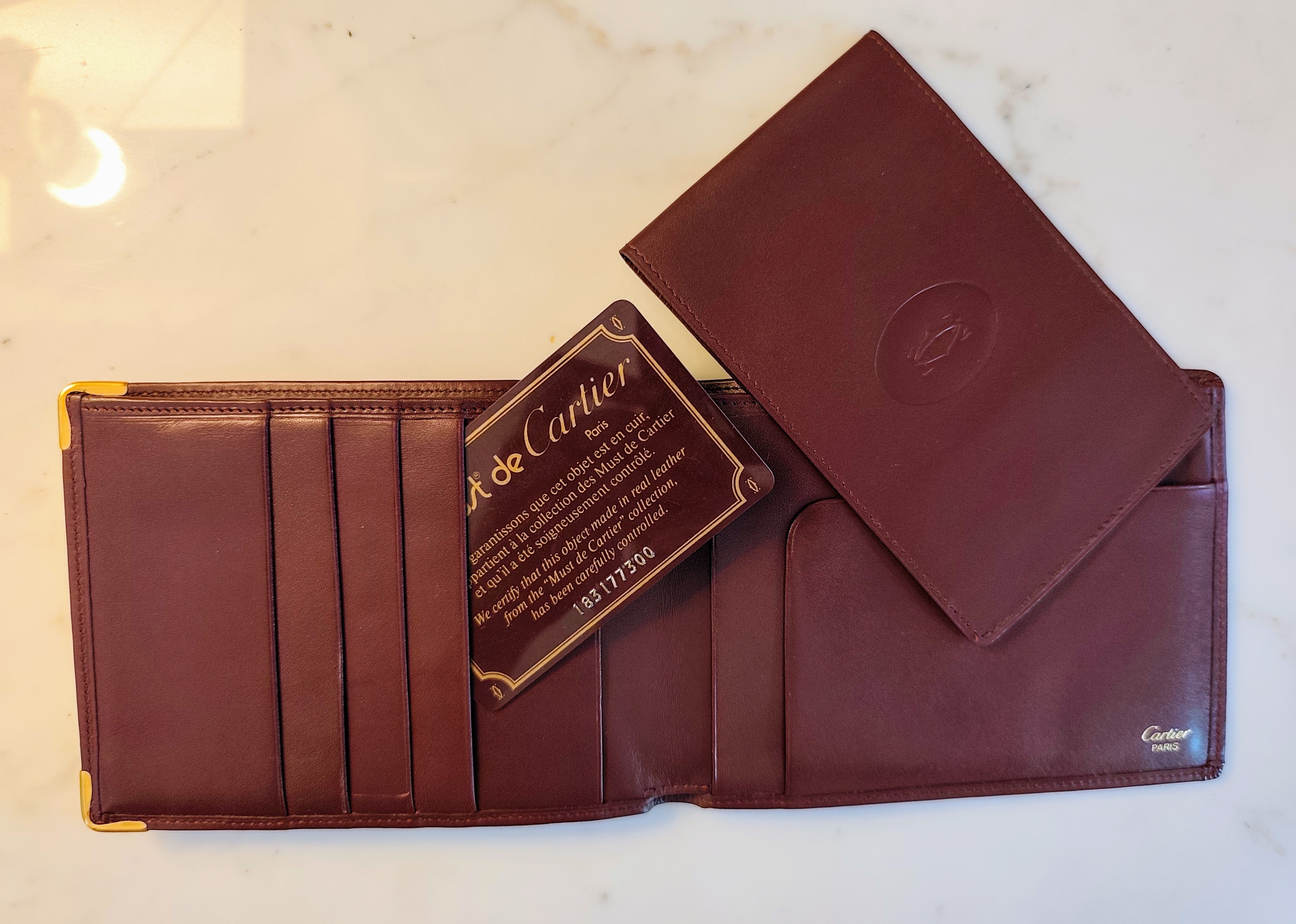 Cartier – Portafoglio in Pelle Bordeaux con Porta Assegni Staccabile