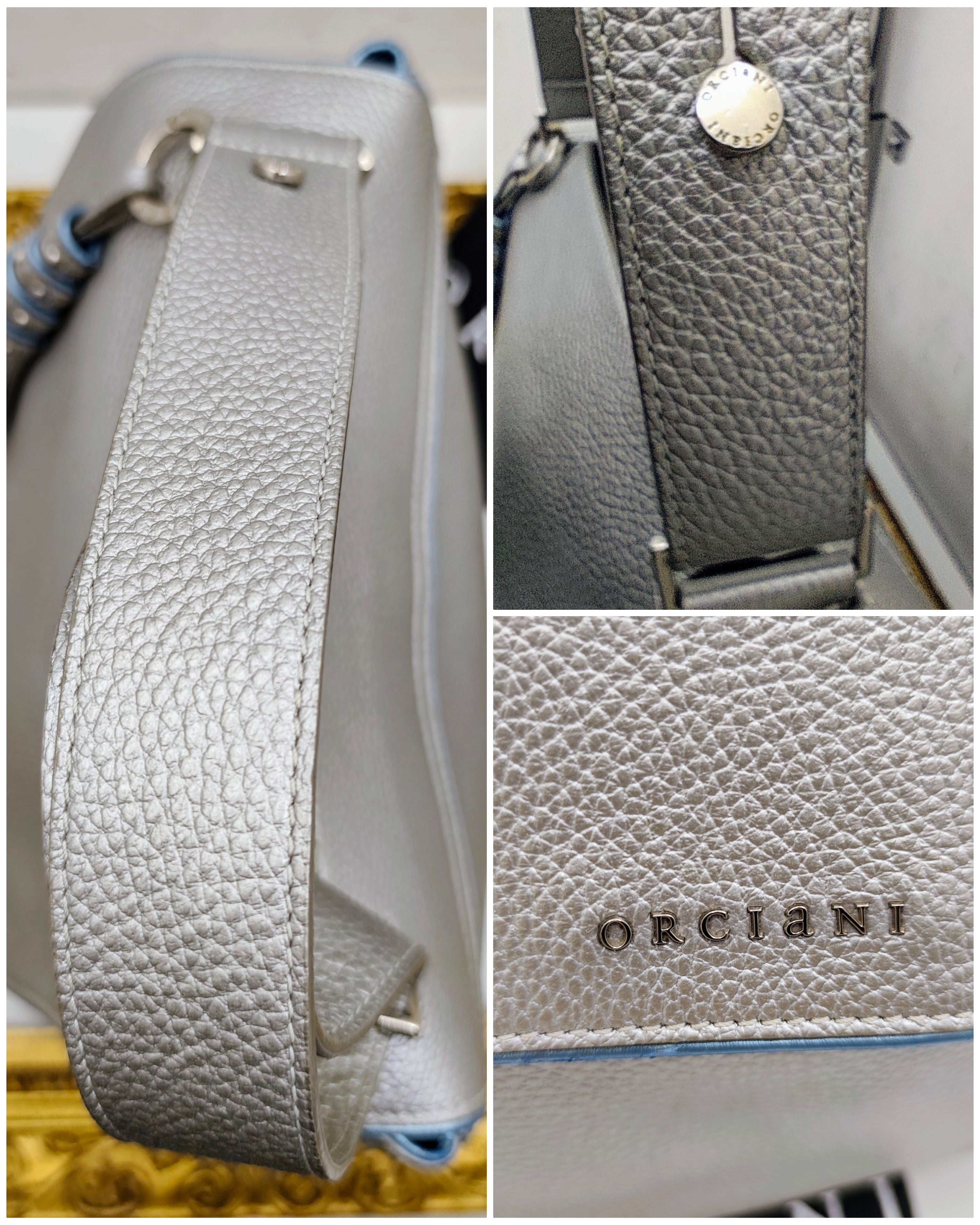 Orciani – Sveva Soft Media Pelle Martellata Argento con Profili Azzurri e Charm Nappina