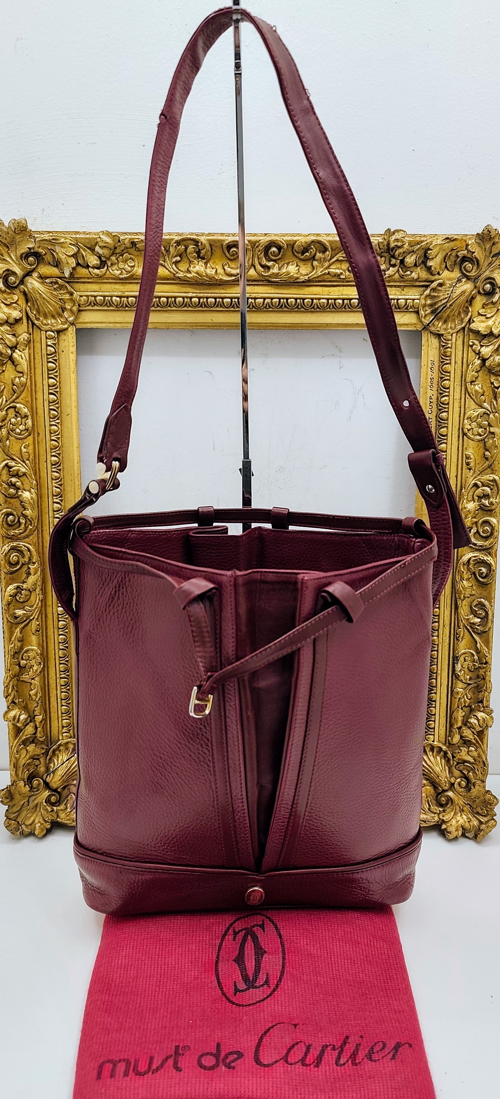 Cartier – Secchiello ovale in pelle bordeaux vintage