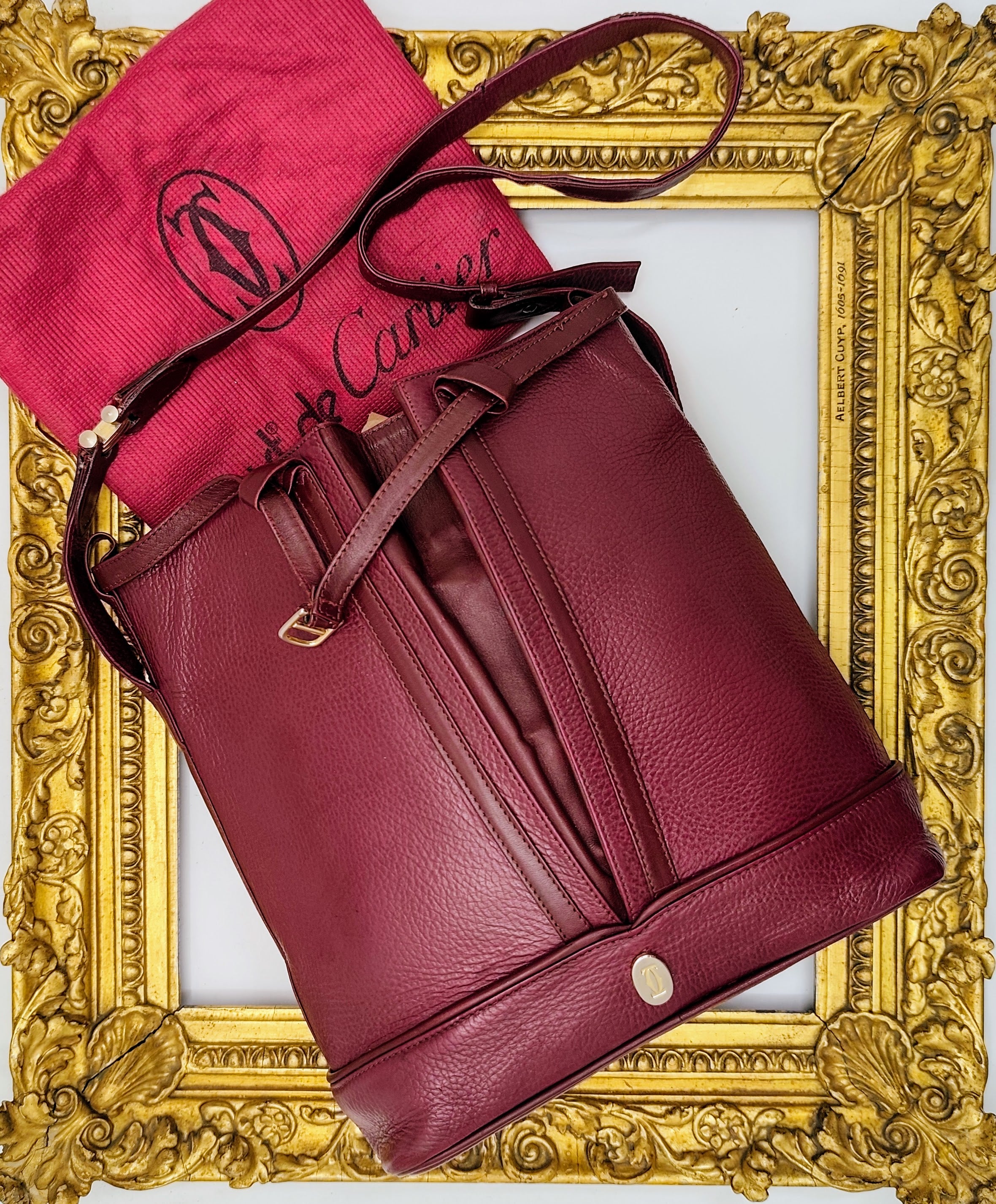 Cartier – Secchiello ovale in pelle bordeaux vintage