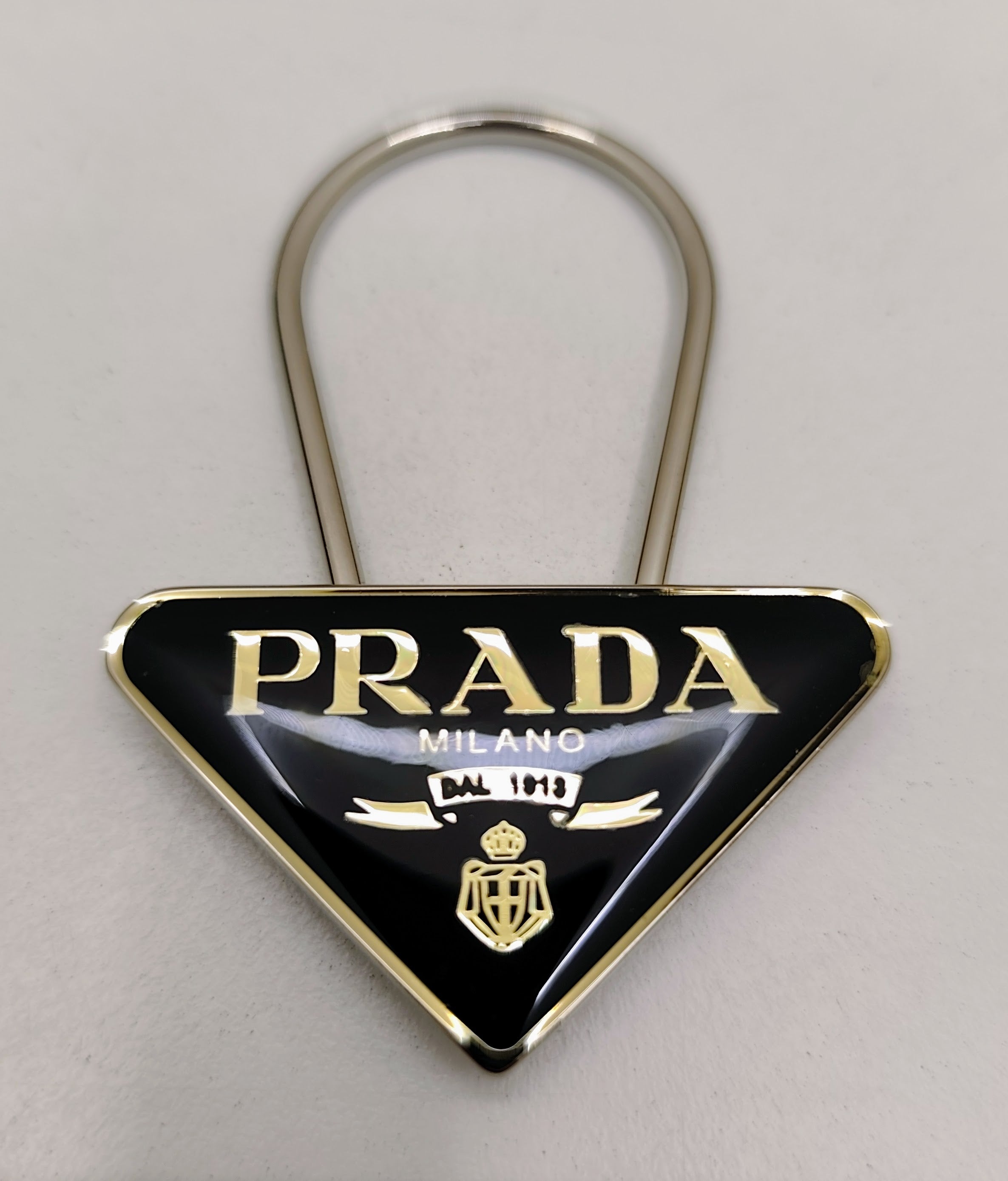 Prada – Portachiavi Metallo Logo Triangolo Smaltato Nero