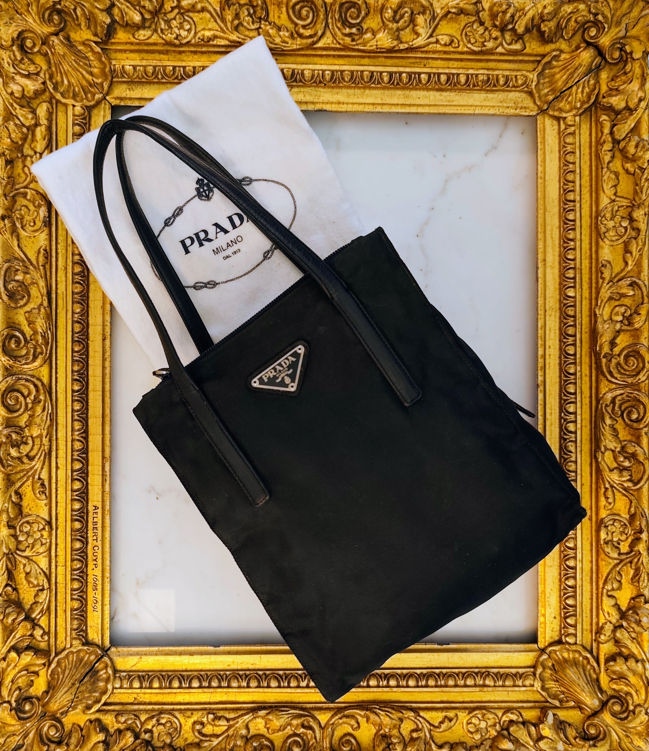 Prada – Mini Tote Bag Vintage in Re-Nylon Nero e Pelle