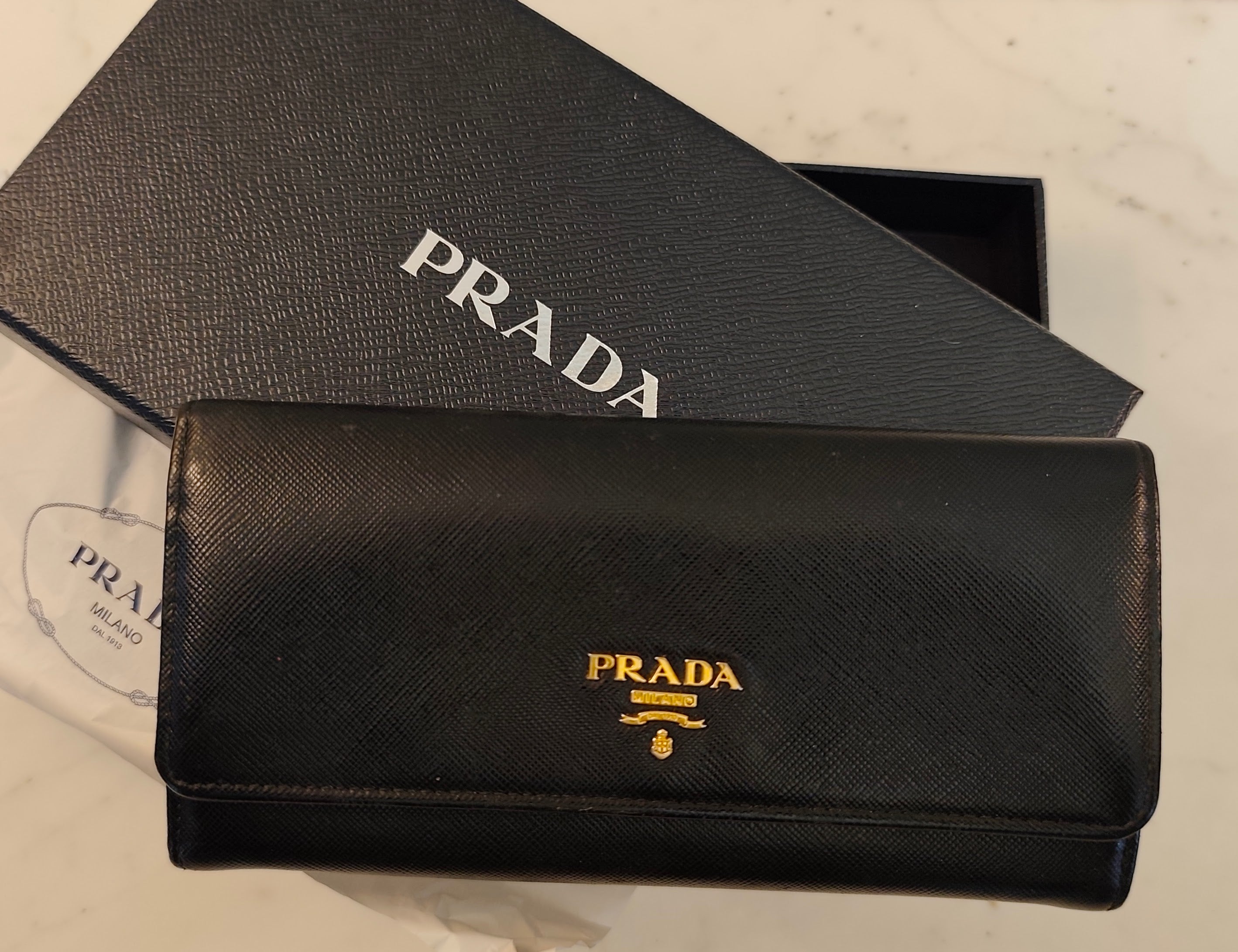 Prada - Portafoglio Grande Pelle Saffiano Nera Logo Lettering
