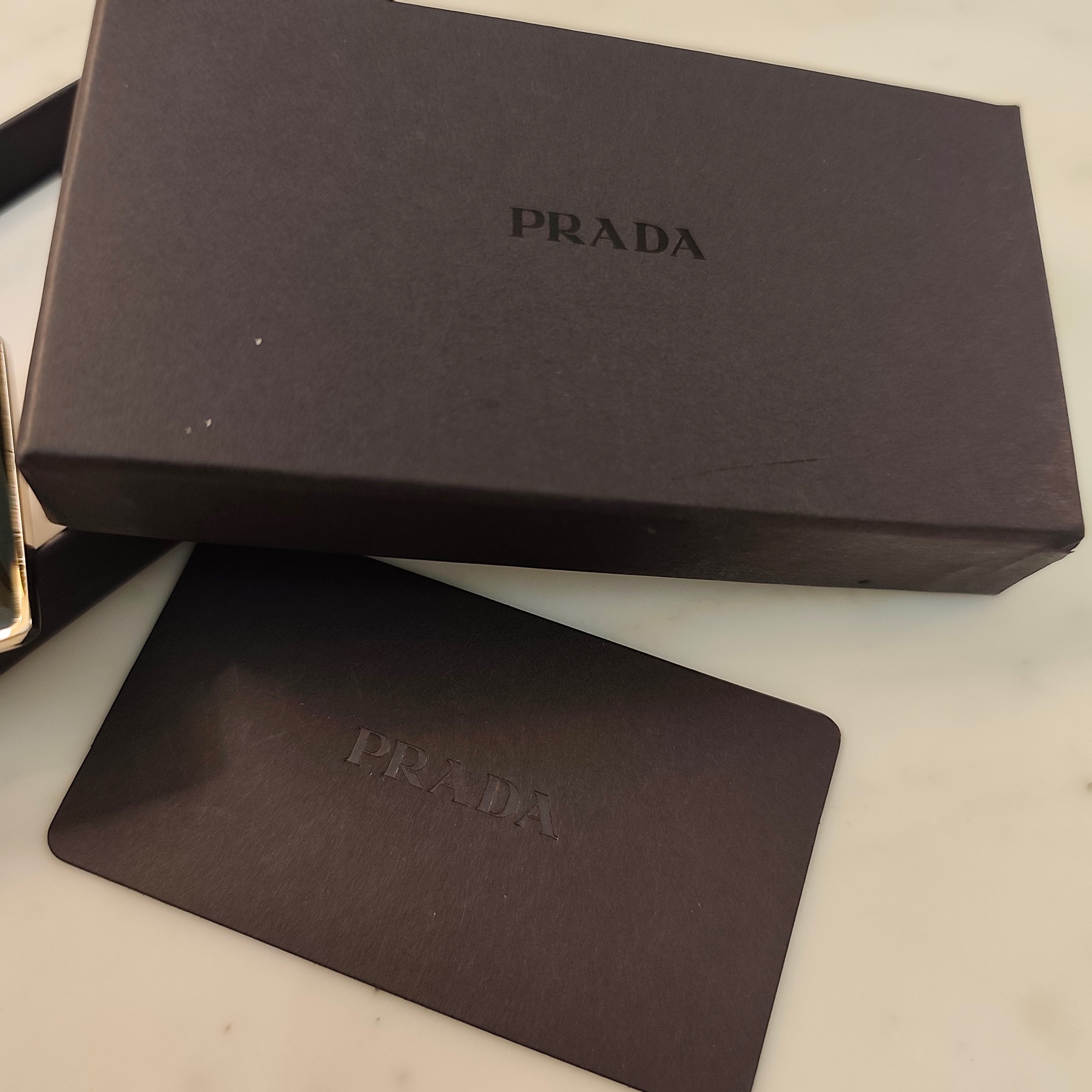 Prada - Portachiavi Unisex - in Metallo con Triangolo Smaltato Nero