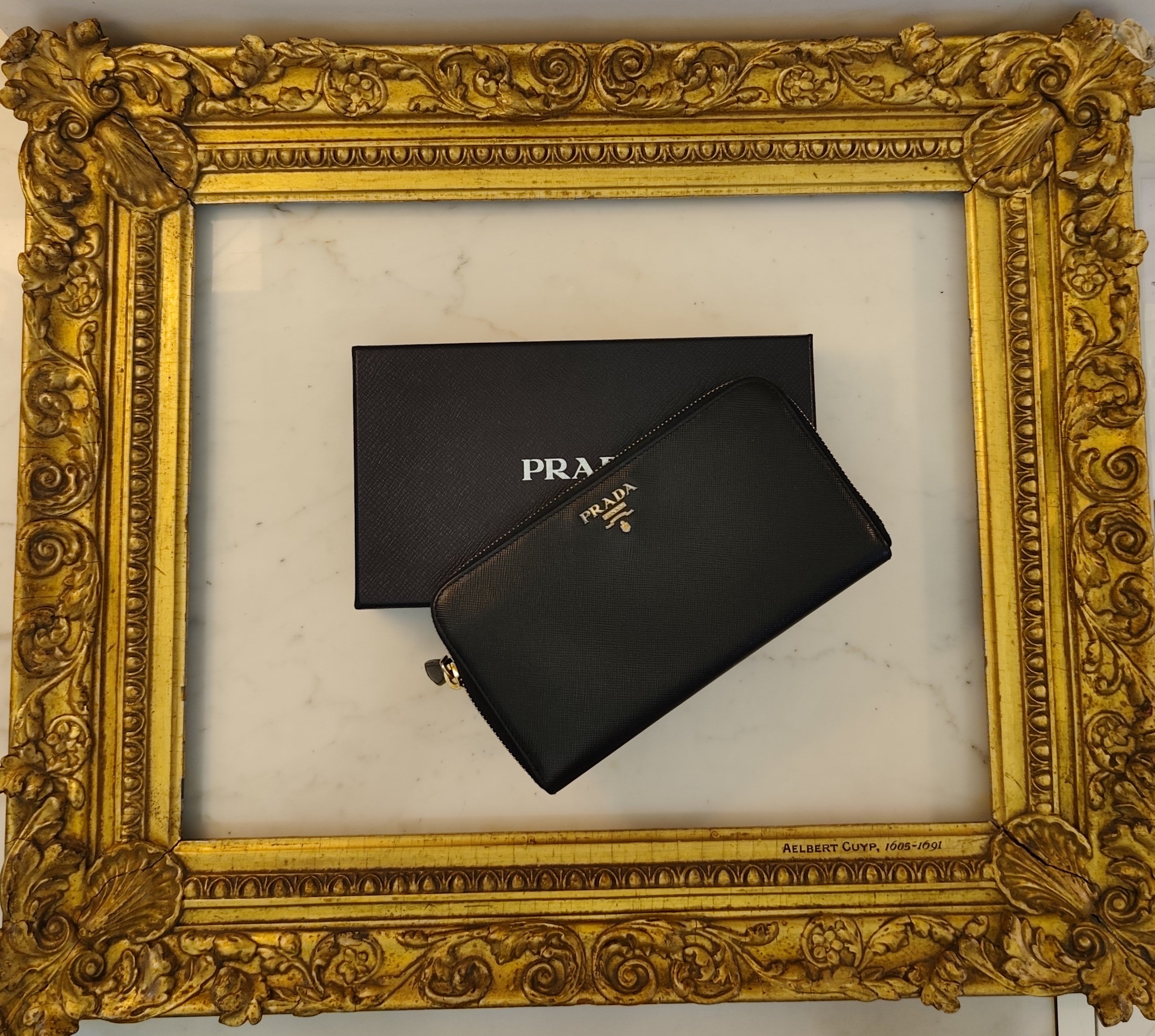 Prada – Portafoglio Continental Zip All-Around in Saffiano Nero