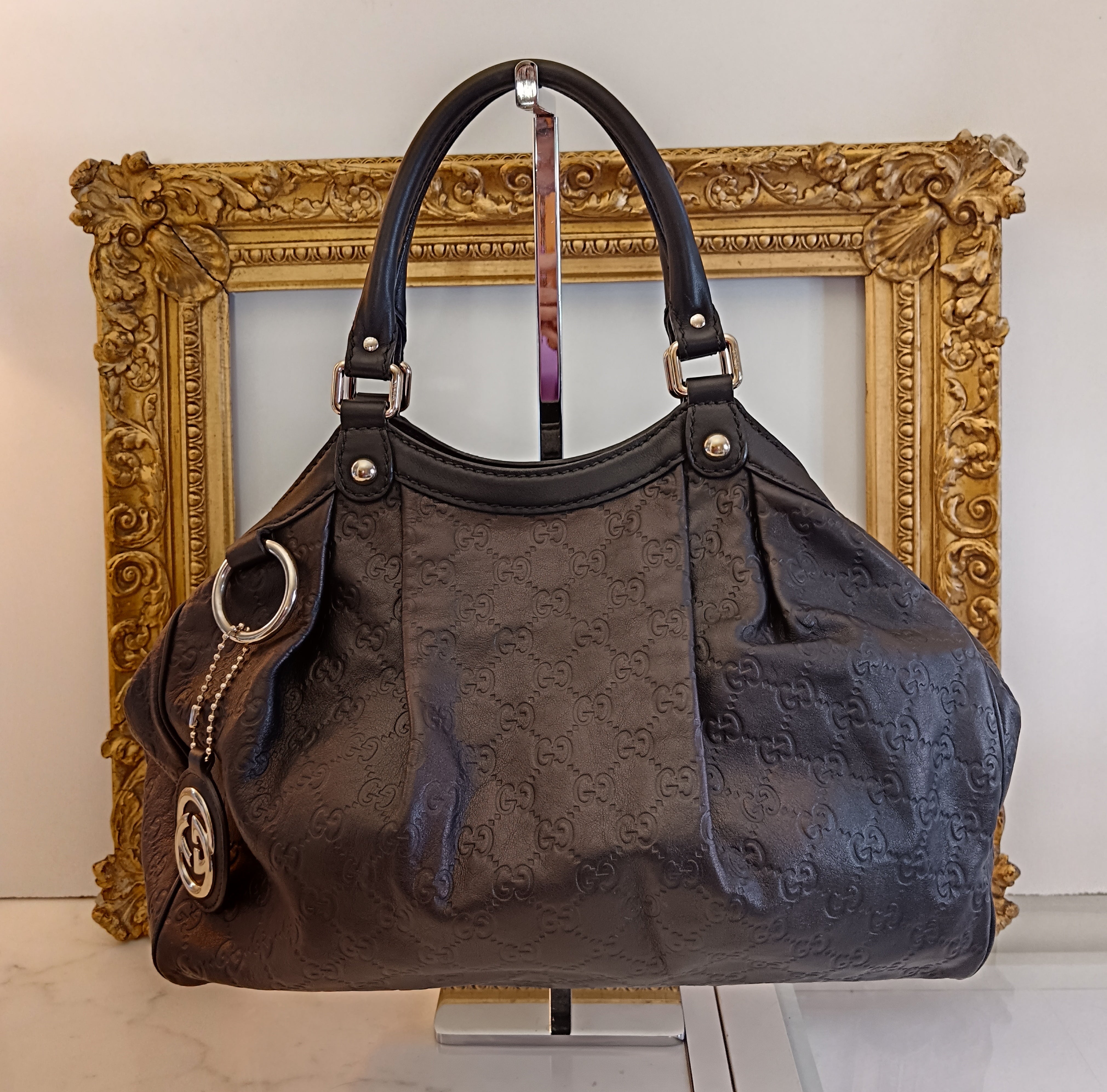 Gucci - Sukey pelle guccissima nera ambrata con charm